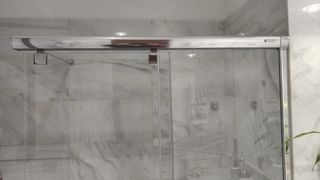 Mampara de bañera cristal y metal