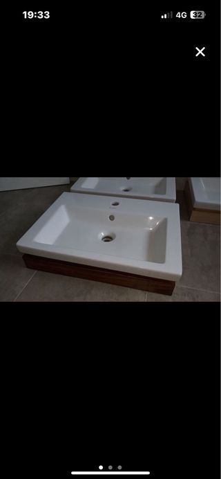 Lavabo de porcelana y madera