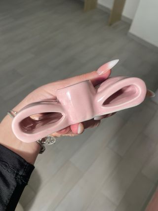 Portacandele a forma di fiocco in ceramica rosa