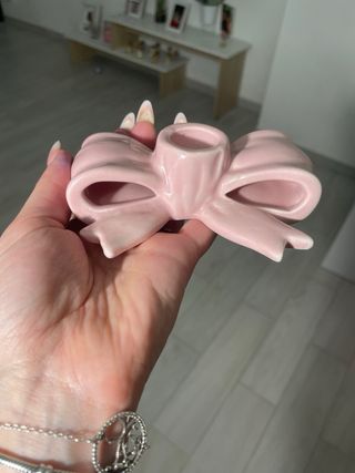 Portacandele a forma di fiocco in ceramica rosa