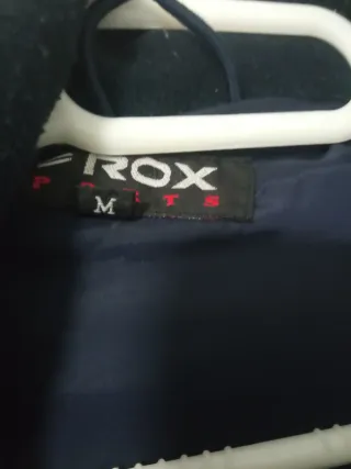 Plumífero hombre azul y blanco