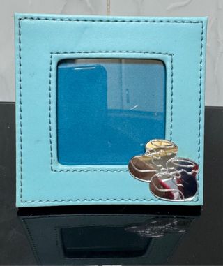 Marco de fotos azul con botitas