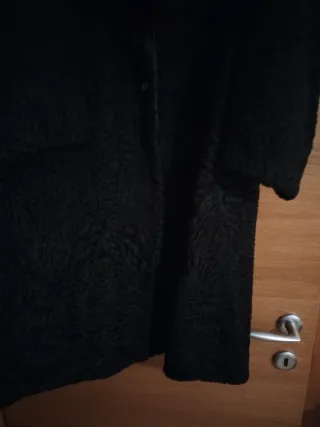 Cappotto elegante in pelliccia nera