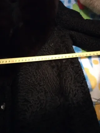 Cappotto elegante in pelliccia nera