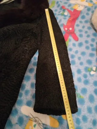 Cappotto elegante in pelliccia nera