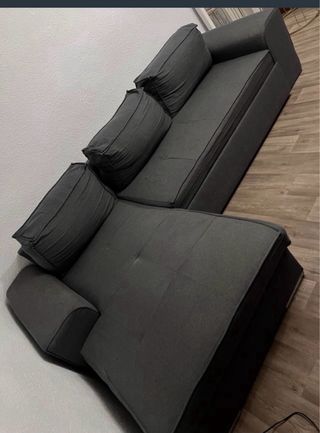Sofá cama gris de tela