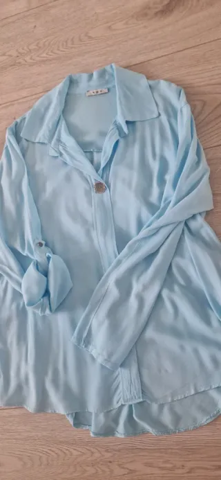 Blusa azul manga larga