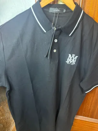 Polo Amiri Negro con Logo Blanco