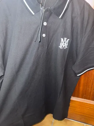 Polo Amiri Negro con Logo Blanco