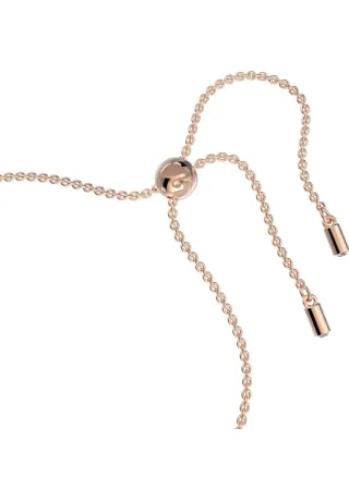 Pulsera ajustable con circonitas rosas y blancas.