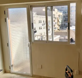 Balconera y ventana de aluminio