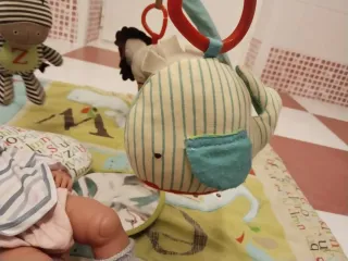 Manta de juegos con almohada y accesorios