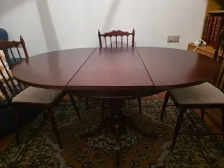 Mesa de comedor redonda de madera extensible