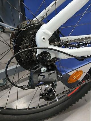 Bicicleta eléctrica MTB Rockrider E-ST 100 Blanco Rojo