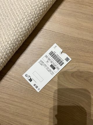 Alfombra beige con puntos multicolor