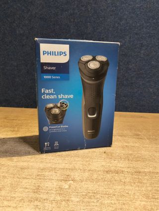 Philips Shaver series 1000 Afeitadora en seco para afeitado práctico y sencillo