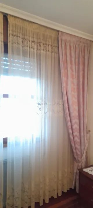 Cortinas beige y rosa