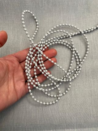 Estor enrollable gris y blanco