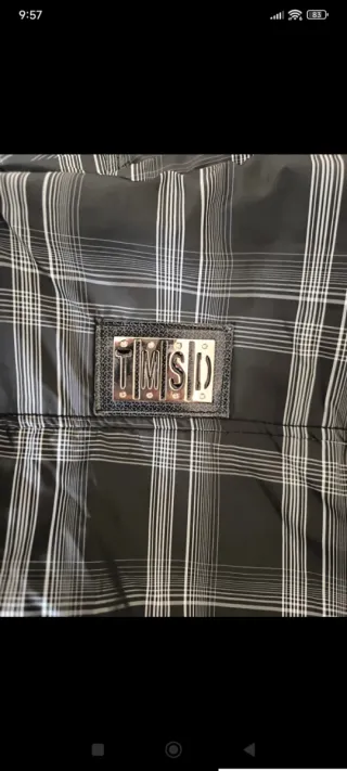 Chaqueta a cuadros con capucha