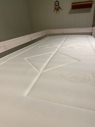 Cama alta con tobogán