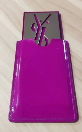 Espejo compacto YSL dorado y morado