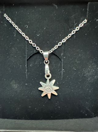 Collana con ciondolo occhio stellato