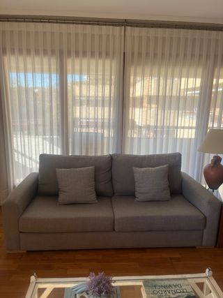 Sofá 4 plazas gris hecho a medida.