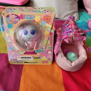 Ksimerito Lokolorin con cuna moisés