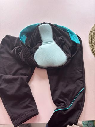 Pantalone da spinning nero con banda turchese