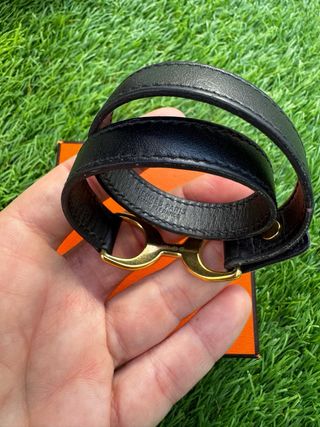 Pulsera Hermes Negra y Dorada