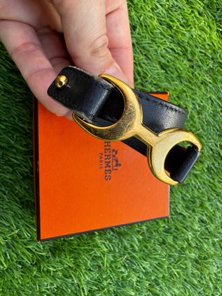 Pulsera Hermes Negra y Dorada