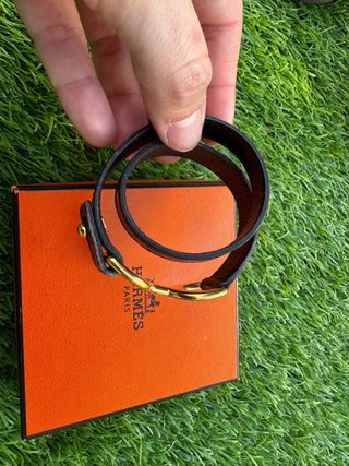 Pulsera Hermes Negra y Dorada
