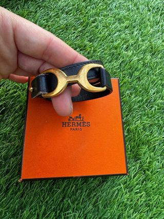 Pulsera Hermes Negra y Dorada