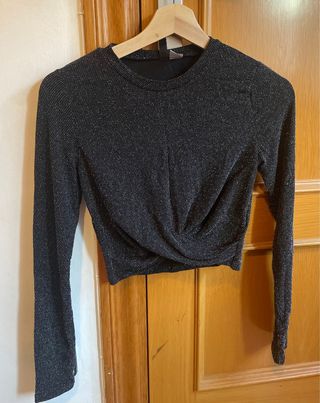 Jersey brillante negro y plateado