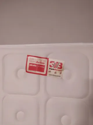 Colchón y base de láminas