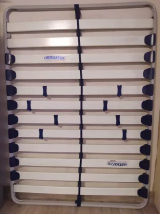 Colchón y base de láminas