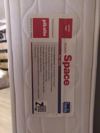 Colchón y base de láminas