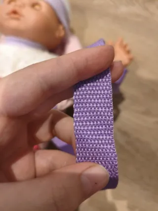 Mochila portamuñecos rosa con pájaro