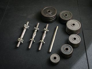 Set pesas Proiron hierro + mancuernas y barra