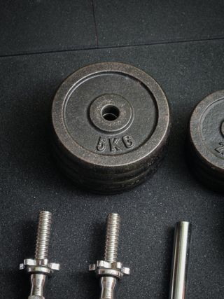 Set pesas Proiron hierro + mancuernas y barra