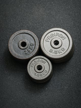 Set pesas Proiron hierro + mancuernas y barra