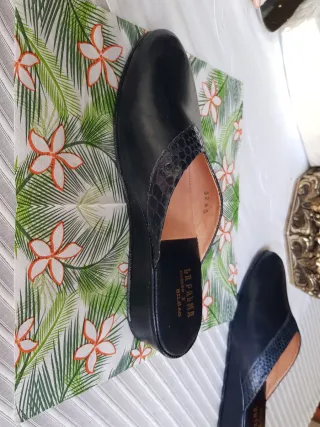 Zapatillas silenciosas para casa de piel