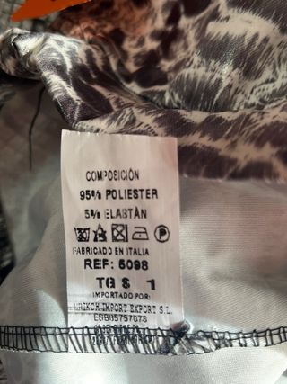 Pantalón campana estampado serpiente mujer