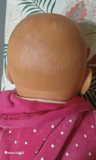 Muñeco bebé vintage rosa lunares