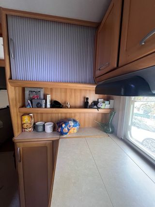 Mueble cocina con nevera trivalente