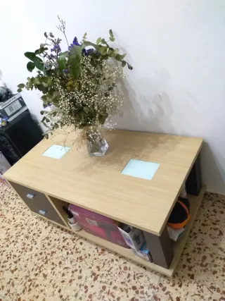 Mesa de centro madera y cristal le falta un tirado