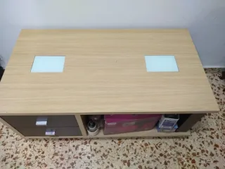 Mesa de centro madera y cristal le falta un tirado