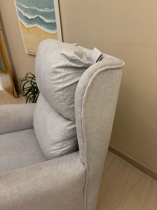 Sillón de tela gris