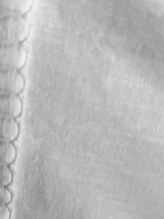 Sábana antigua y funda de almohada de algodón