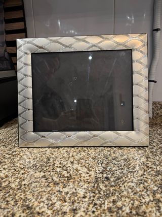 Portaretrato de plata con diseño